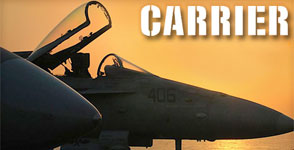 Sun sets on fighter planes aboard the USS Nimitz