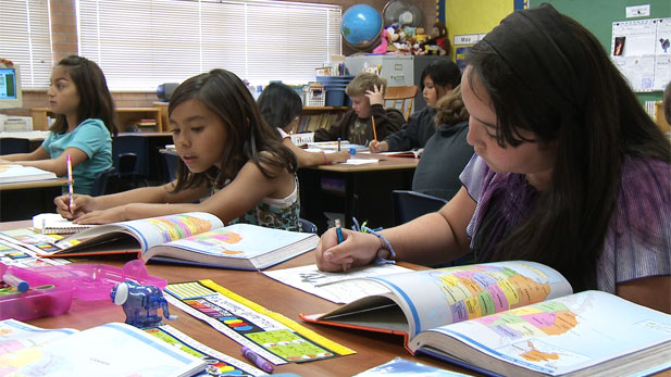 schoolchildren studying