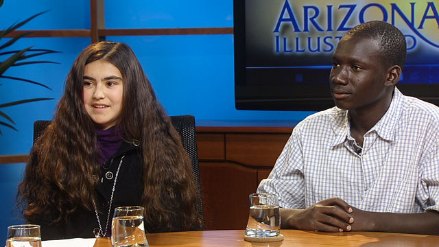 Student poets Samantha Neville (left) and Ochana Otto compete in poetry recitation.