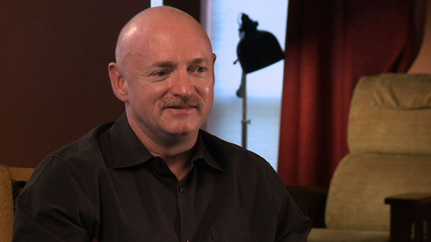 Mark Kelly says U.S. Rep. Gabrielle Giffords continues to improve, including long walks and more speaking ability.