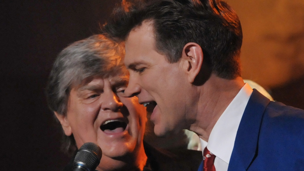 Phil Everly and Chris Isaak perform during the concert held at Hollywood's Music Box Theatre in celebration of what would have been Buddy Holly's 75th birthday, September 7, 2011.
