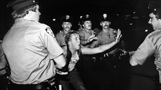 Lesbian protester and cops