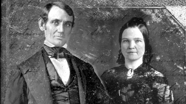 Abraham and Mary Lincoln pictured along with imagery of the White House and their marriage certificate.