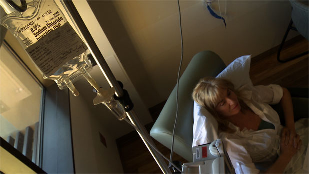 Kelly Guinn's breast cancer treatment complements chemotherapy with alternative therapies.