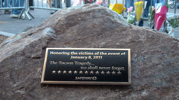 A new memorial, quietly erected in the days before the tragedy's anniversary, marks the place where six died and 13 more were wounded.