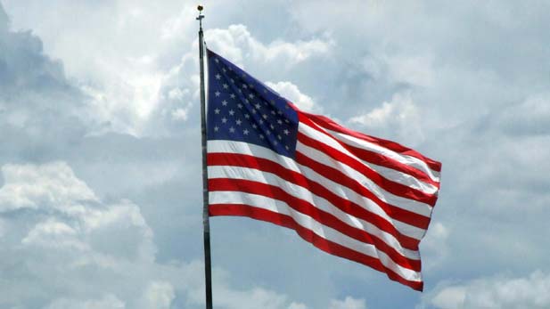 Stock Waving American Flag Spotlight 