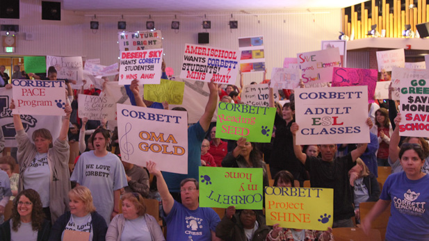 Hundreds protest the closure of schools in the Tucson Unified School District.