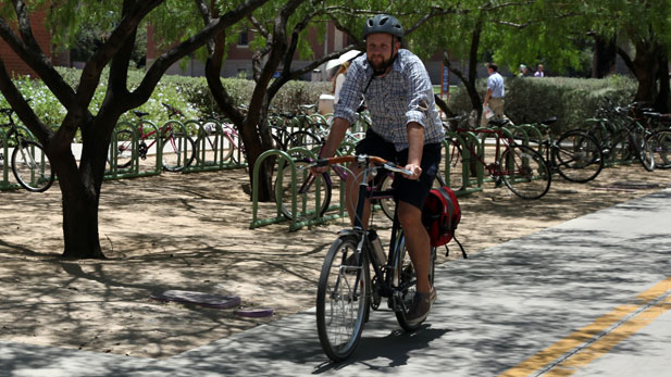 michael mckisson riding bike 617x347