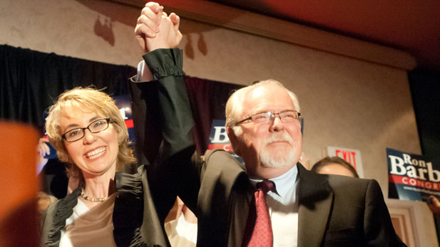 Democrat Ron Barber celebrates his win in Congressional District 8 with his former boss, Gabrielle Giffords.