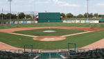 Crews work on the field at Kino Stadium during an off day for the Tucson Padres.
