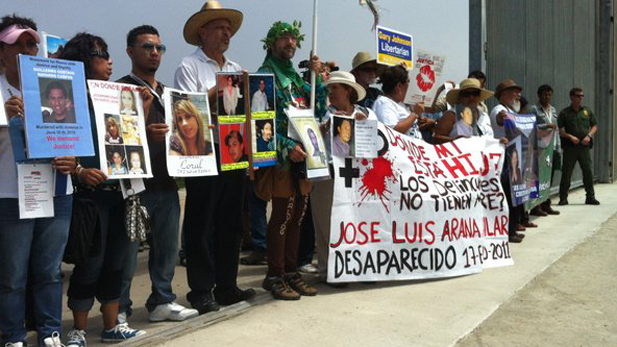 Survivors memorialize loved ones lost to Mexico's drug war at Border Field State Park in San Diego.