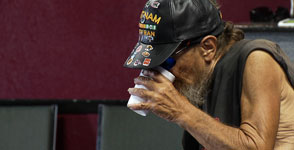 Homeless Man Drinks Water Focus Homeless Man Drinks Water Focus