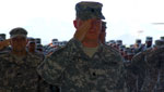 9/10/12, Rebecca Brukman.
National Guard Troops salute as they prepare for departure.