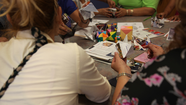 TUSD moms work on hands-on math projects during the 12th Annual Title I Family Conference. 