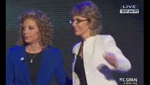 Former U.S. Rep. Gabrielle Giffords, D-Ariz., appears at the September, 2012 Democratic National Convention to lead the delegates in the Pledge of Allegiance. She appears with U.S. Rep. Debbie Wasserman-Schultz, D-Fla.