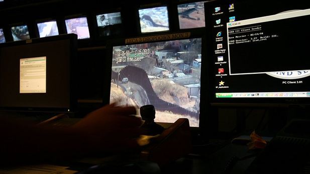 Border monitors in the Border Patrol's Nogales communications center.