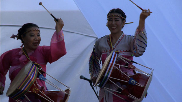Female Asian Drum Group Spot