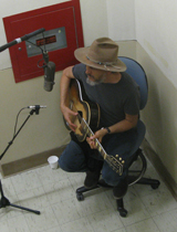 howe gelb above portrait