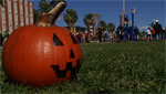 Students participate in the Tucson Pumpkin Toss, where they use physics and engineering to build trebuchets and catapults to hurl gourds through the air.