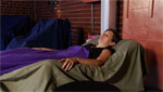 A patient relaxes at an acupuncture session, a complementary and alternative medicine practice.