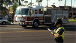 A Tucson fire truck arrives on the scene of a car accident.