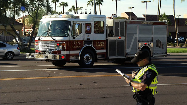 A Tempe fire truck arrives on the scene of a car accident. 