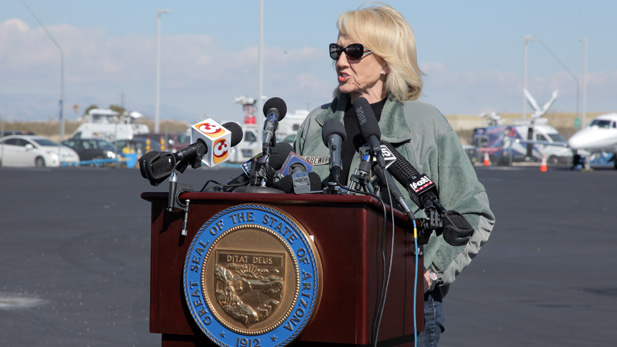 Ariz. Gov. Jan Brewer speaking to reporters in Tucson after a February 2013 tour of the border.