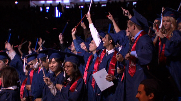 Students celebrate their achievements at a University of Arizona graduation ceremony. 