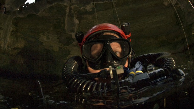 Explorer Jill Heinerth takes air from re-breather.