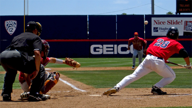 Infielder David Lopez bunts...