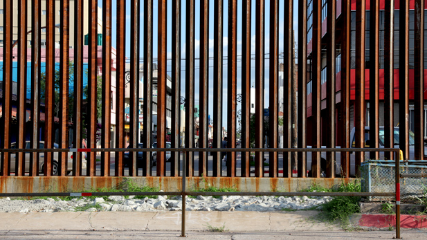 Nogales Sonora in Mexico as seen through the international border fence 