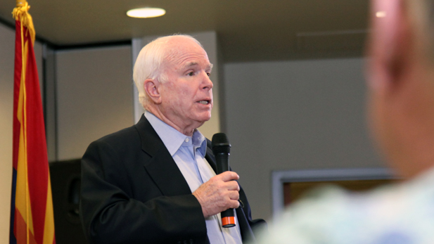 U.S. Sen. John McCain speaks to more than 100 people at a town hall in Tucson, Aug. 13, 2013.