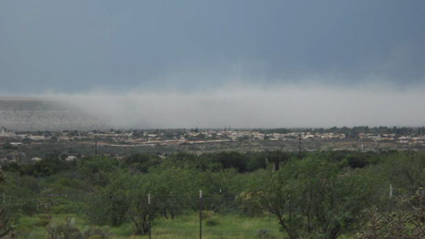 Dust blows from Freeport MacMoRan mine tailings near Green Valley, Ariz., in July 2013. The incident led Pima County to issue a notice that the company violated air quality standards.