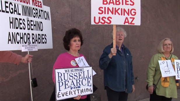 ind_lens_st_az_protest-signs_spot