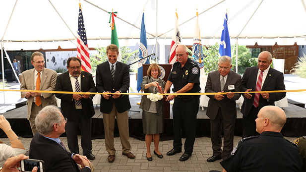 Federal officials, lawmakers mark opening of the new Mariposa Port of Entry in Nogales, following renovations. Among attendees, Nogales Mayor Arturo Garino, far right, U.S. Rep. Raul Grijalva and U.S. Sen. Jeff Flake, both near far left.