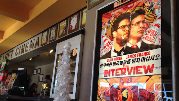 Poster for "The Interview" in The Loft Cinema lobby.