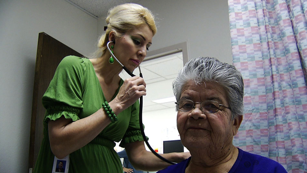 Linda Williams, a physician at El Rio Community Health Clinic, performs a routine checkup on her patient.