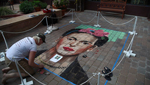 Professional artists create masterpieces with chalk at the 3rd annual Chalk Art Festival.