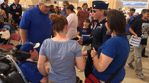 Pilots with the USAF Thunderbirds meet with audience members at Davis-Monthan Air Force Base on April 11, 2014.
