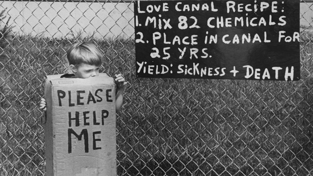 A local boy in Niagara Falls, New York, protests toxic contamination of Love Canal, as seen in "American Masters: A Fierce Green Fire."