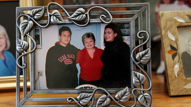 Daniel Moreno photographed with his mother and sister.