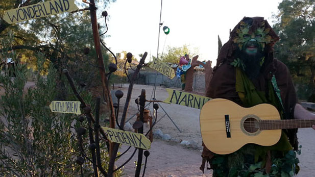 Zack Jarrett - dressed as The Green Man - leads a singalong at Valley of the Moon  