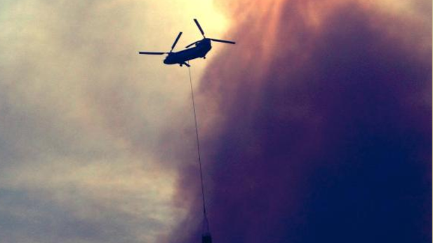 Firefighting helicopter above the Slide Fire in northern Arizona's Oak Creek Canyon.