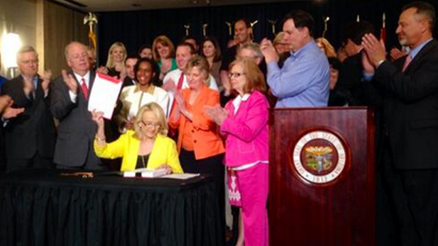 Gov. Jan Brewer signs Thursday two child welfare agency overhaul bills.