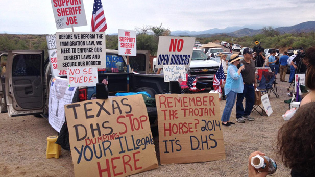 Scene outside Oracle where demonstrators anticipated the arrival of illegal immigrant children.