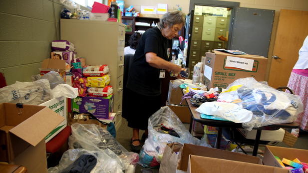 Volunteers sorting through donations at Catholic Community Services drop off site.