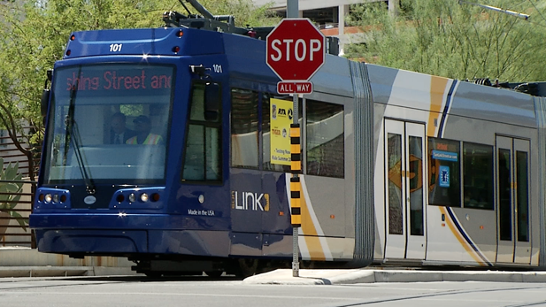 Tucson's streetcar emerges from the Fourth Avenue underpass. 