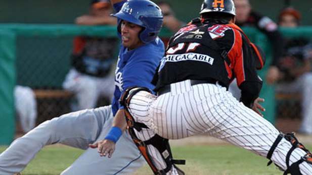 Action at the 2014 Tucson Mexican Baseball Festival.