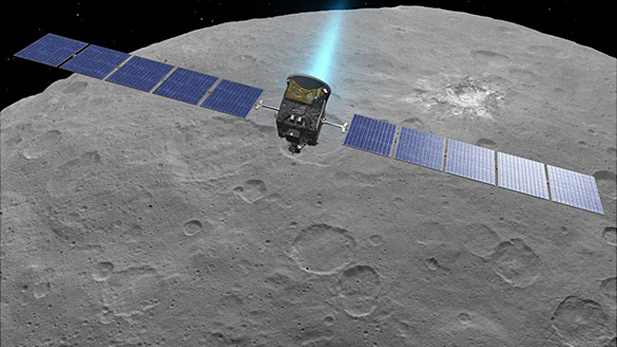 Artist rendition of Dawn spacecraft nearing dwarf planet Ceres