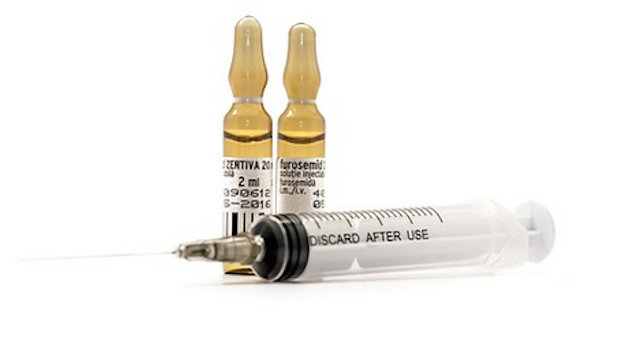 needle syringe vaccinate spotlight